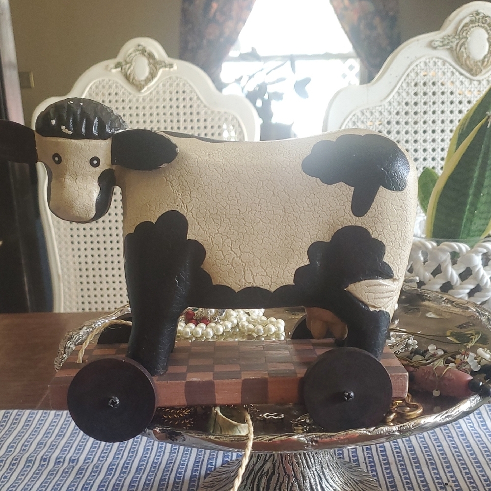 Charming Cow Figurine on Wheels